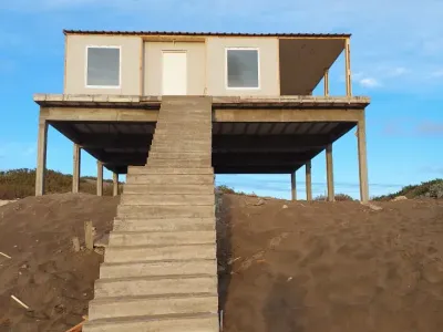 Vivienda tradicional prefabricada de Tu Cassa entregada e instalada en el terreno del cliente