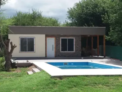 Vivienda tradicional prefabricada de Tu Cassa entregada e instalada en el terreno del cliente