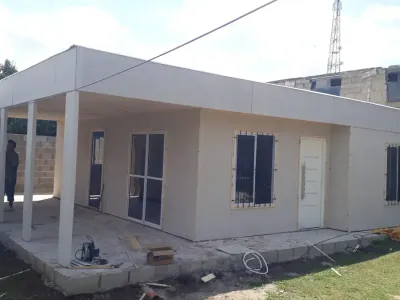 Vivienda tradicional prefabricada de Tu Cassa entregada e instalada en el terreno del cliente